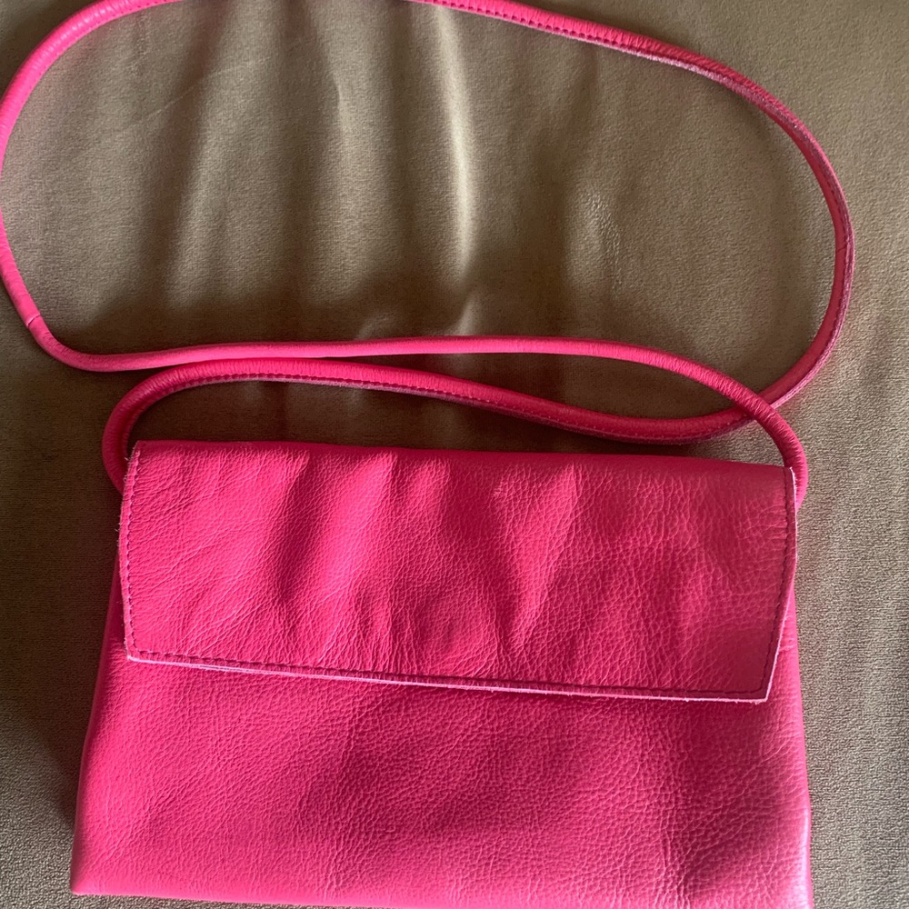 Free people pink leather crossbody bag clutch. NWOT.